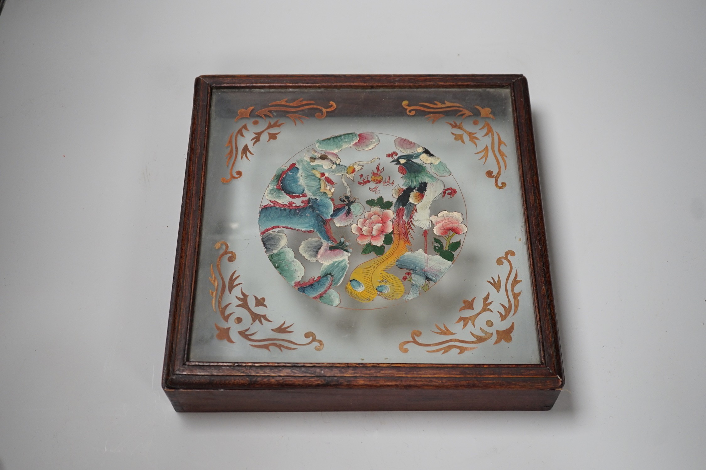 A Chinese reverse glass painting and a box cover with reverse painted glass panel